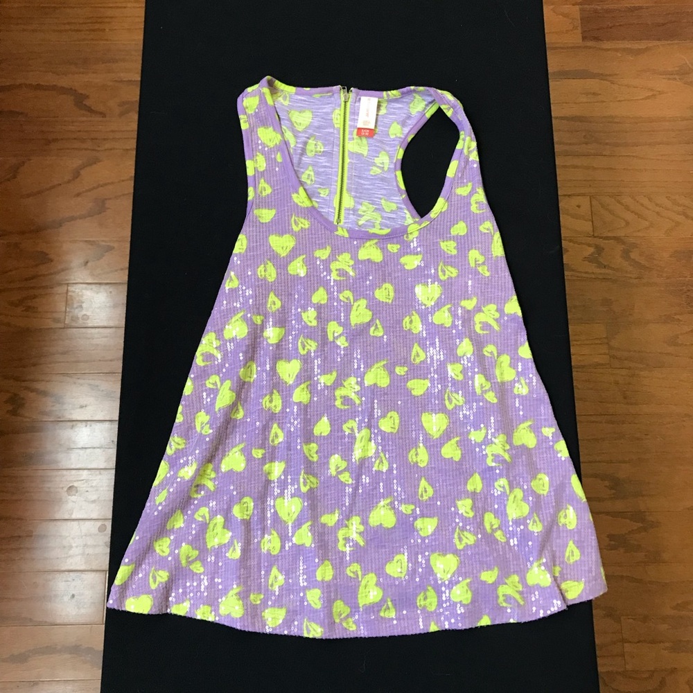 Purple and green sequin dress.
